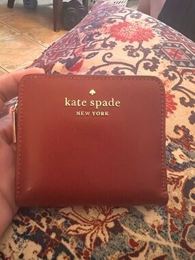 kate spade Red Saffiano Zip Wallet with Gold Logo